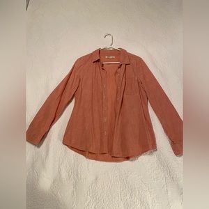 Salmon button up shirt.